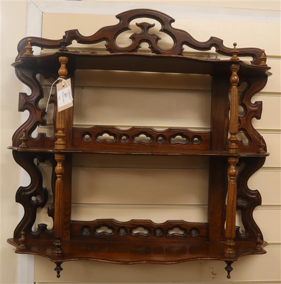 A mahogany three tier wall shelf W.46cm